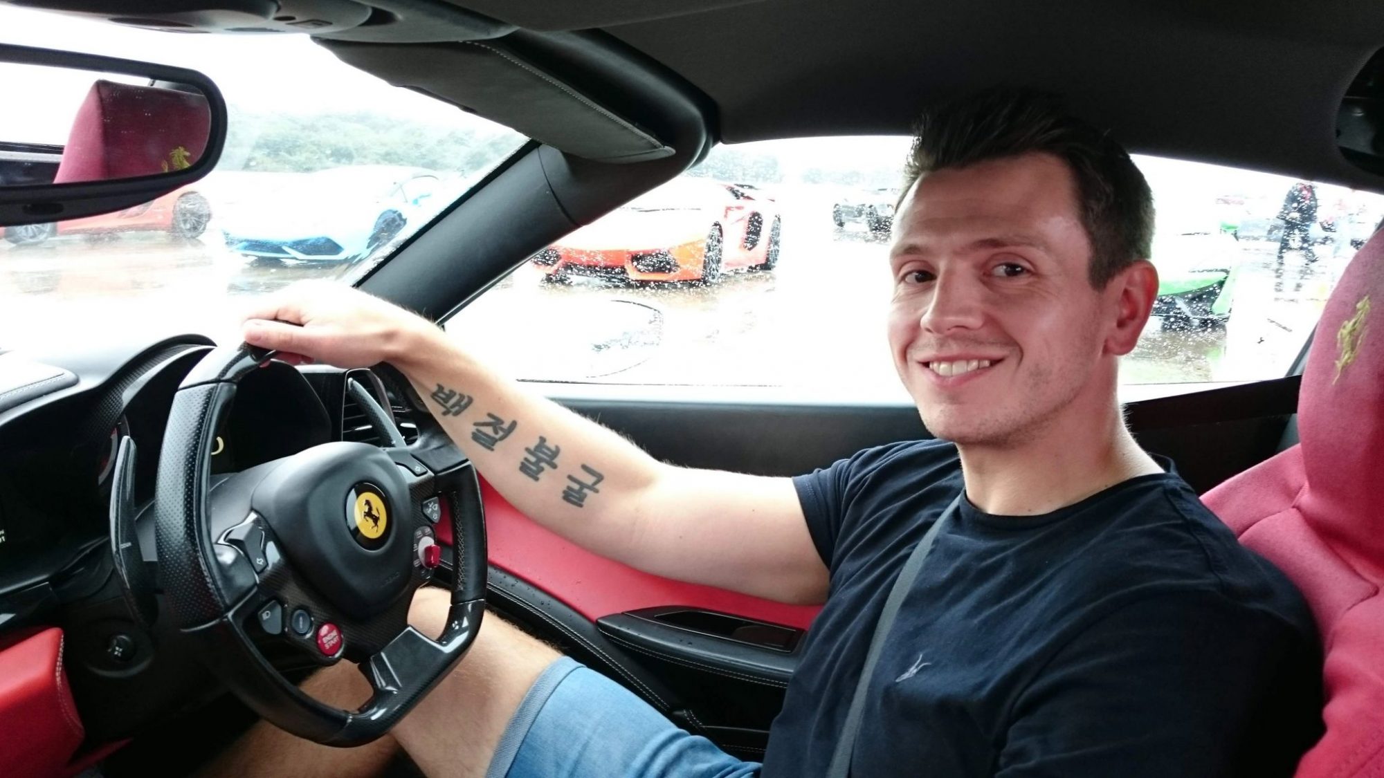 Stuart Wade The Mind Coach driving a Ferrari 458
